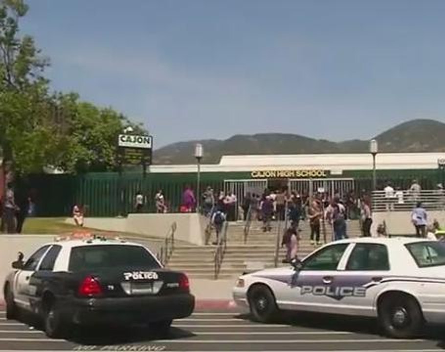 Relieved parents meet up with children after school shooting