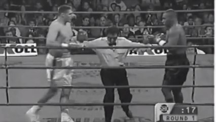 That One Time Mike Tyson's Opponent Begged His Coach To Stop The Fight In-Between Rounds (VIDEO)