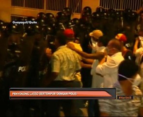 Penyokong Lasso bertempur dengan polis