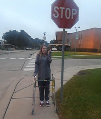 The moment a young woman takes her first steps after devastating car crash and four surgeries