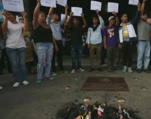 Guatemalans request resignation of president and justice for 38 killed in fire