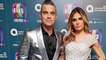 Robbie Williams and Ayda Field introduce their new baby