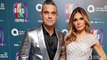 Robbie Williams and Ayda Field introduce their new baby