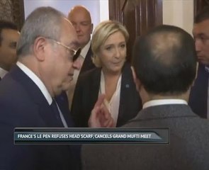 France's Le Pen refuses head scarf, cancels Grand Mufti meet