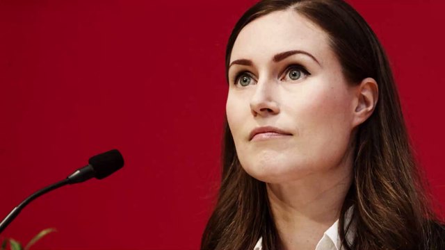 Finnish Prime Minister causes quite a stir after going topless under plunging black blazer