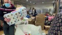 Volunteers pack aid for Ukraine