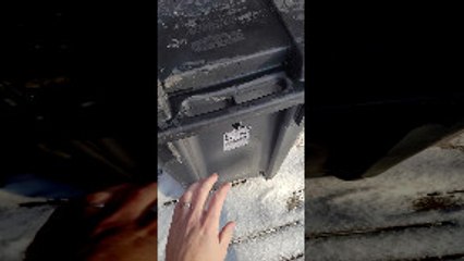 Runaway Trash Can on Icy Ground