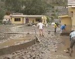 Dramatic video shows mudslide hitting homes in greater Lima