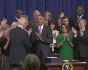 Barack Obama signs bipartisan bill for new investment in health