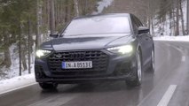 The new Audi A8 60 TFSI e quattro in Plasma Blue Driving Video
