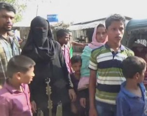Hundreds of Rohingya cross into Bangladesh, fleeing unrest