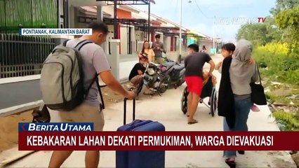 Upaya Evakuasi Seorang Nenek dari Kebakaran Lahan yang Merembet Hingga Mendekati Permukiman