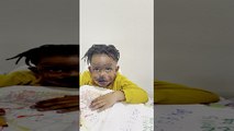 Child with Marker on His Face Plays Innocent