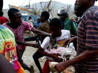 Hurricane victims in need of aid loot food trucks in Haiti