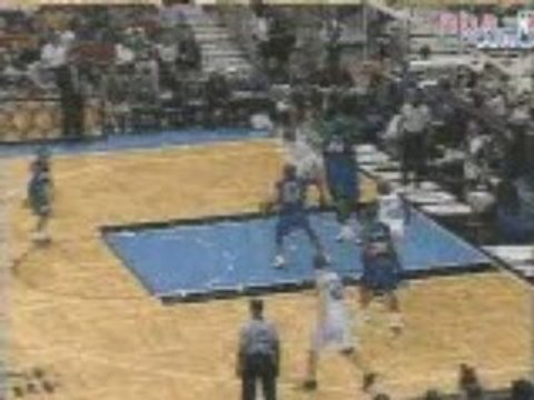 NBA Basketball - tracy mcgrady dunks in mutombo's face