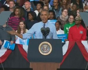 Obama tells protester to "get your own rally"