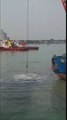 The process of dredging mud on the high seas