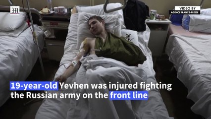 "I'll go right back": wounded Ukrainian soldier vows to fight another day