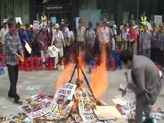 Kim Jong Un effigy burnt in Seoul protest
