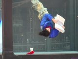Performers enact daily routines in underwater tank in London