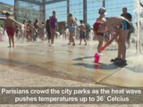 Parisians head to the city parks as temperatures climb