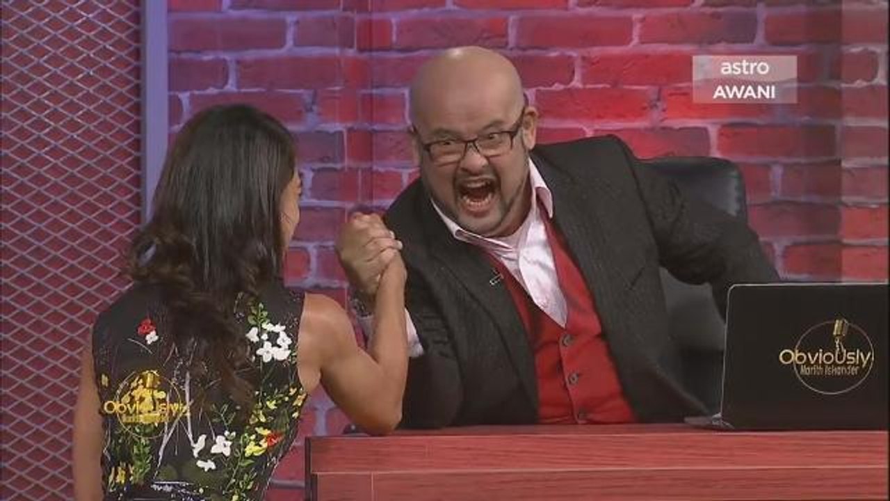 Can Harith Iskander beat Nicol David at arm-wrestling?