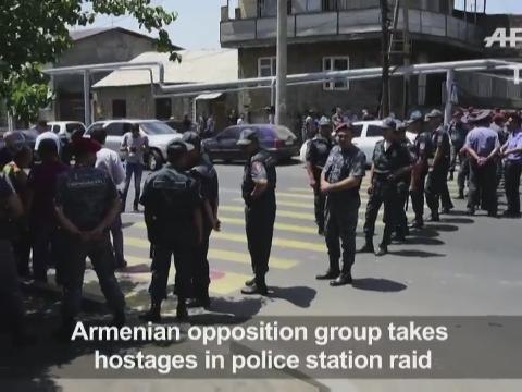 Armenia opposition group takes hostages in police station raid
