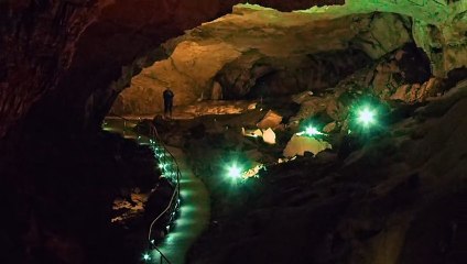 Visitors walking trough cave Vjetrenica