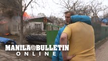 A life up in smoke: Russian shelling turns home to ash outside Kiev city