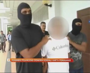 Pemandu pelancong didakwa kendali harta pengganas
