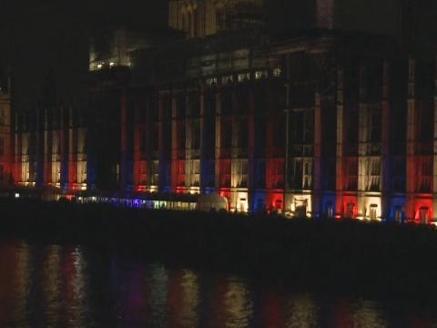 Houses of Parliament lit up with Union Jack colours in London