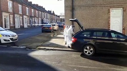 Forensics officers in Marshall Wallis Road on Sunday, March 6
