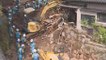 Rescuers race against landslides to reach Japan quake victims