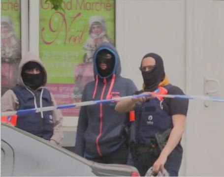 Belgium arrests three Paris attacks suspects in new raid