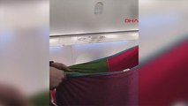 Uçakta ağlayan bebek susmayınca yolcular seferber oldu