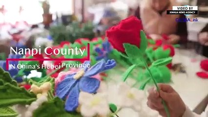 Disabled people knit Winter Paralympics bouquets