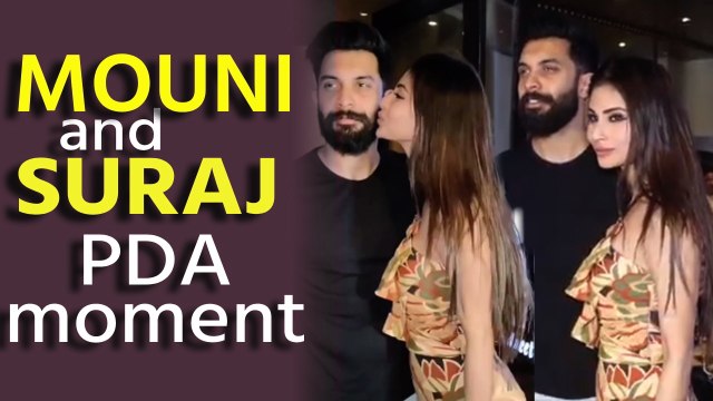 Mouni Roy kisses husband Suraj Nambiar in front of the media