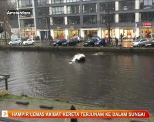 Hampir lemas akibat kereta terjunam ke dalam sungai