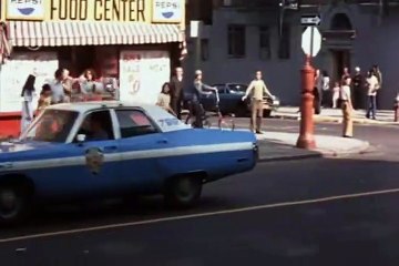 Tarde de perros Tráiler