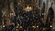 Amid Russian attacks, Ukrainians seek shelter in church