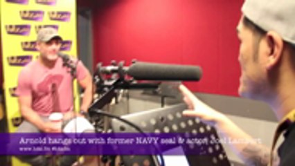 Arnold hangs out with Joel Lambert