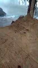 Employees and villagers repairing the erosion of Netharana distributor in Chak 5 DPN