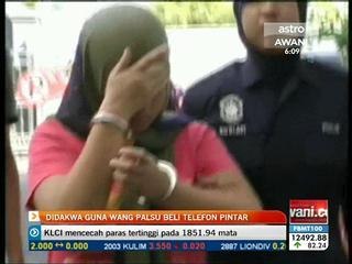 Didakwa guna wang palsu beli telefon pintar