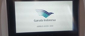 Airbus A330 Garuda Indonesia take off a sunset