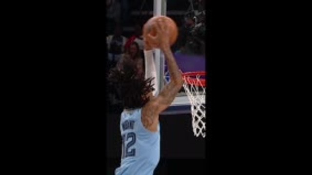 Morant gets crowd roaring with two-handed throwdown