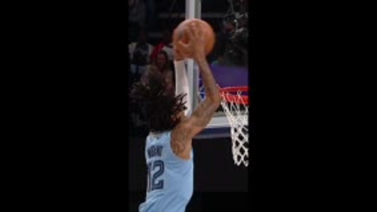 Morant gets crowd roaring with two-handed throwdown