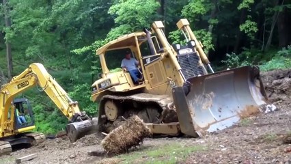 Buldozer and Backhoe making roads