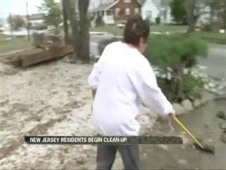 New Jersey residents begin clean-up