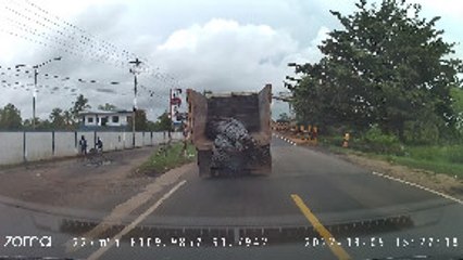 Heavy Load Nearly Tips Over Truck