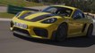 The new Porsche 718 Cayman GT4 RS in Racing Yellow Driving Video